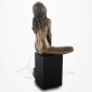 Body Talk - Femme nue assise sur socle, se tenant une cheville
